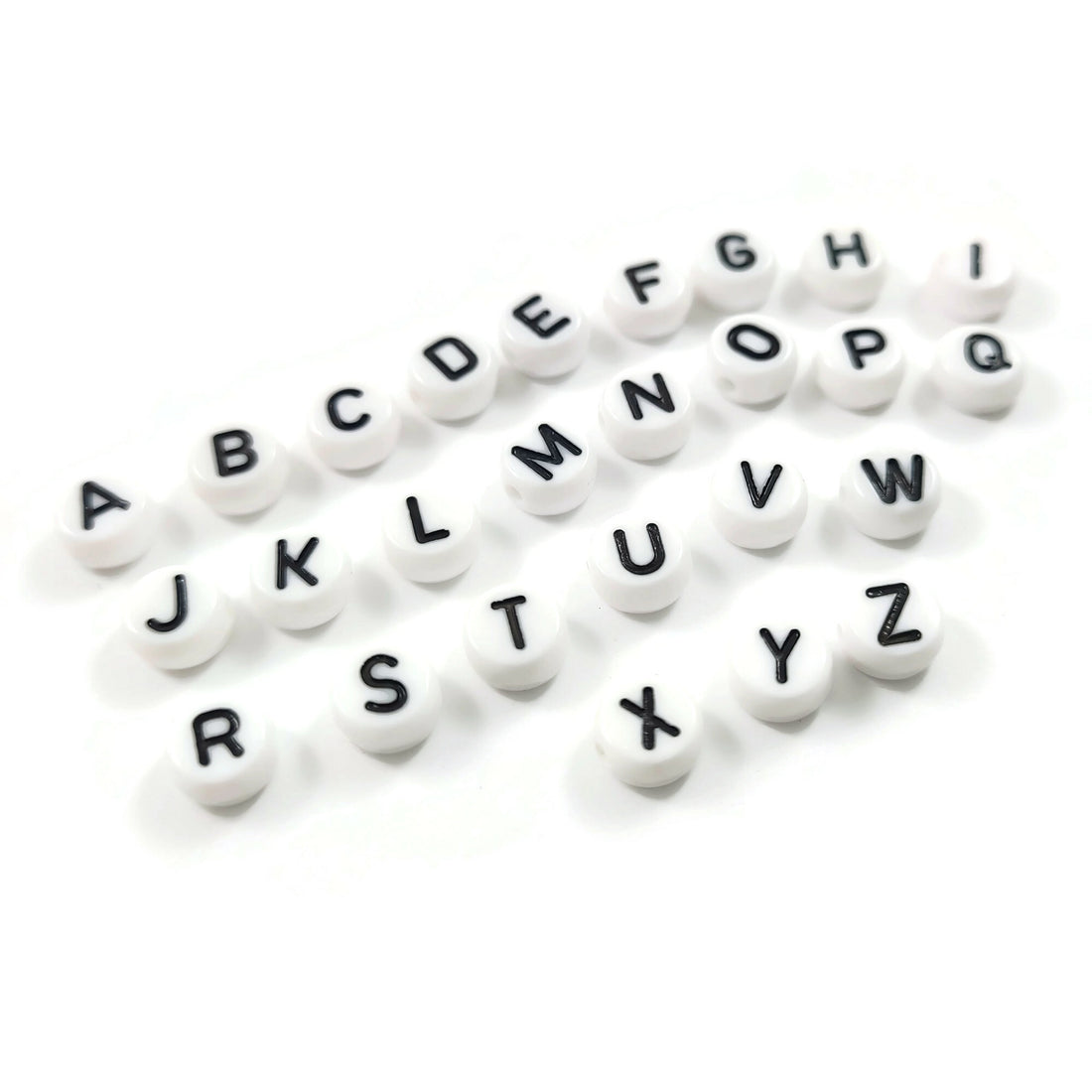 1 Black and white flat round letter bead