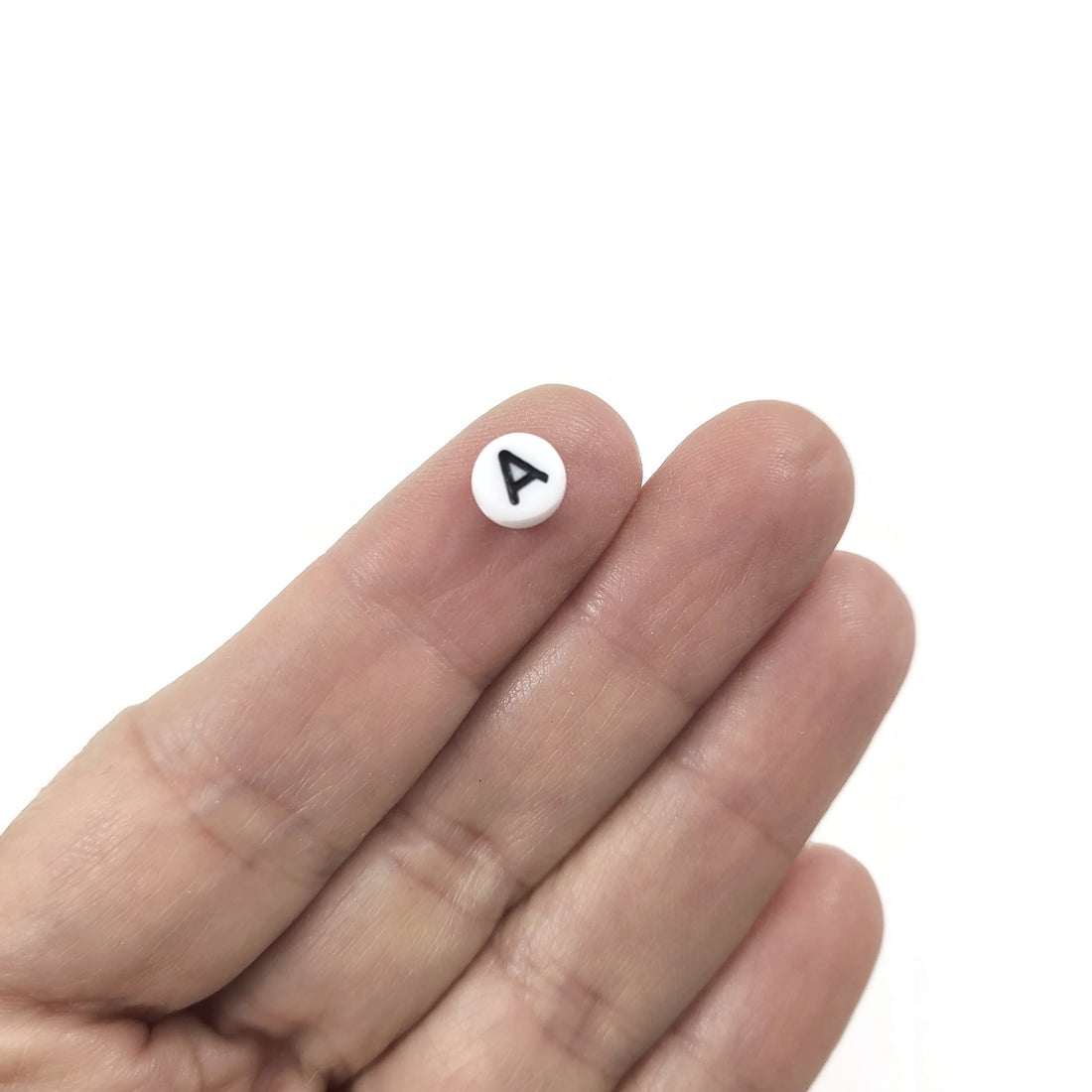 1 Black and white flat round letter bead