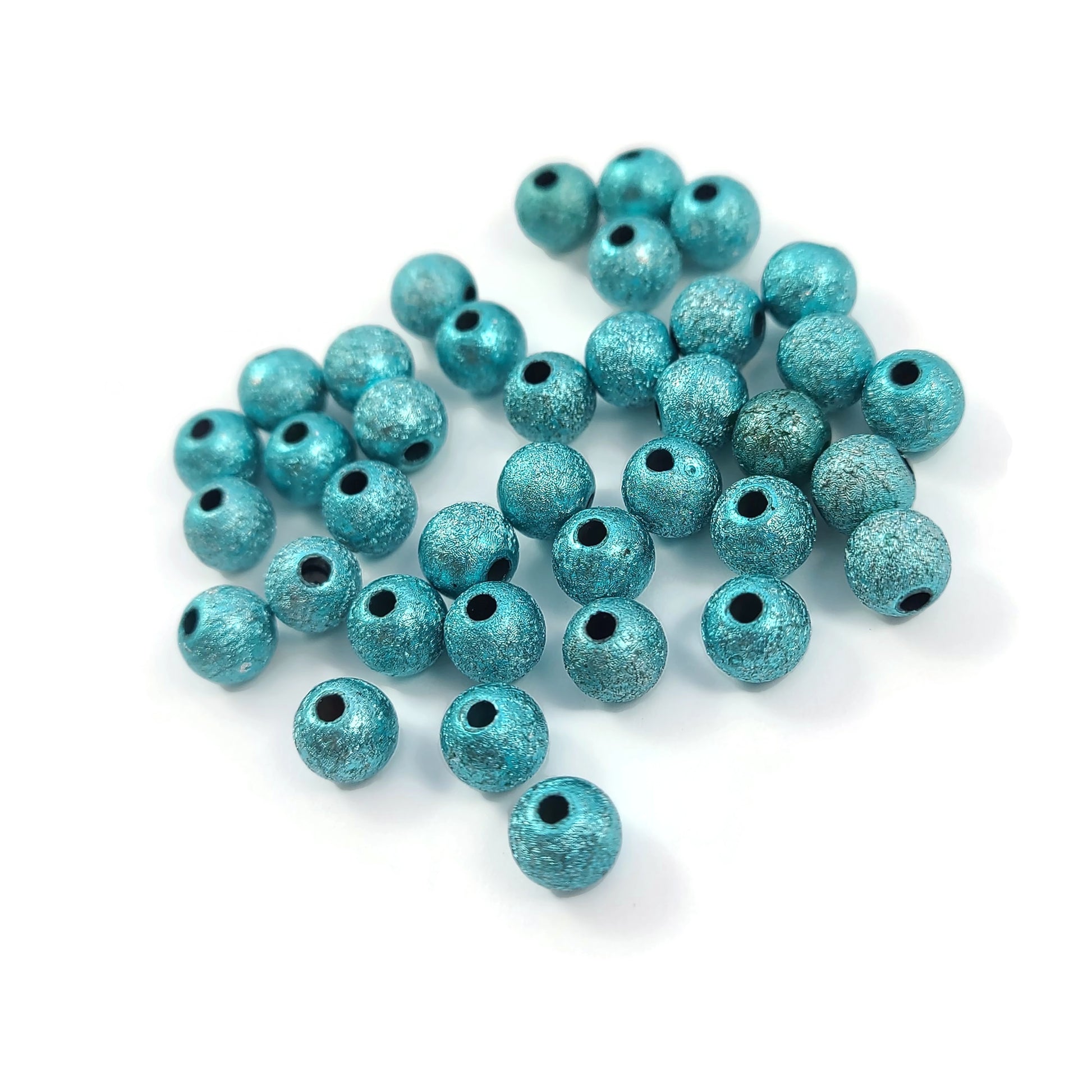 Perles turquoise pailletées de 6mm