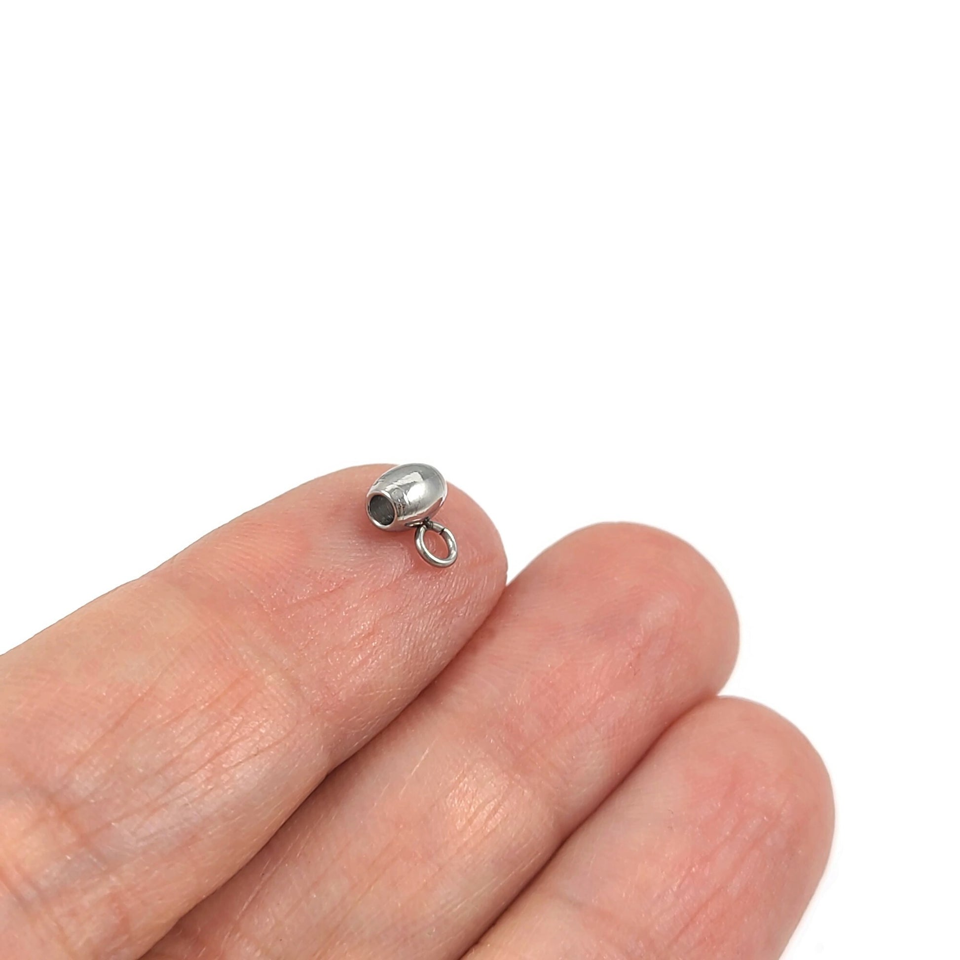 5 perles ovales en acier inoxydable avec anneaux