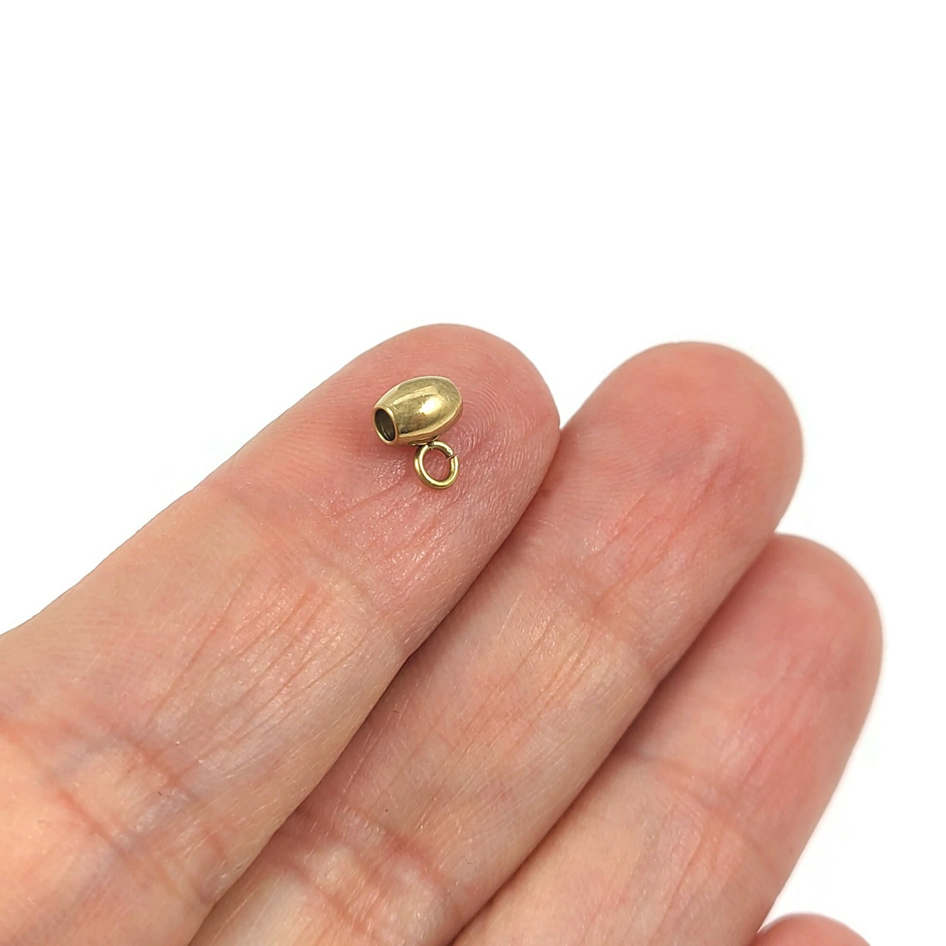 5 perles ovales en acier inoxydable avec anneaux