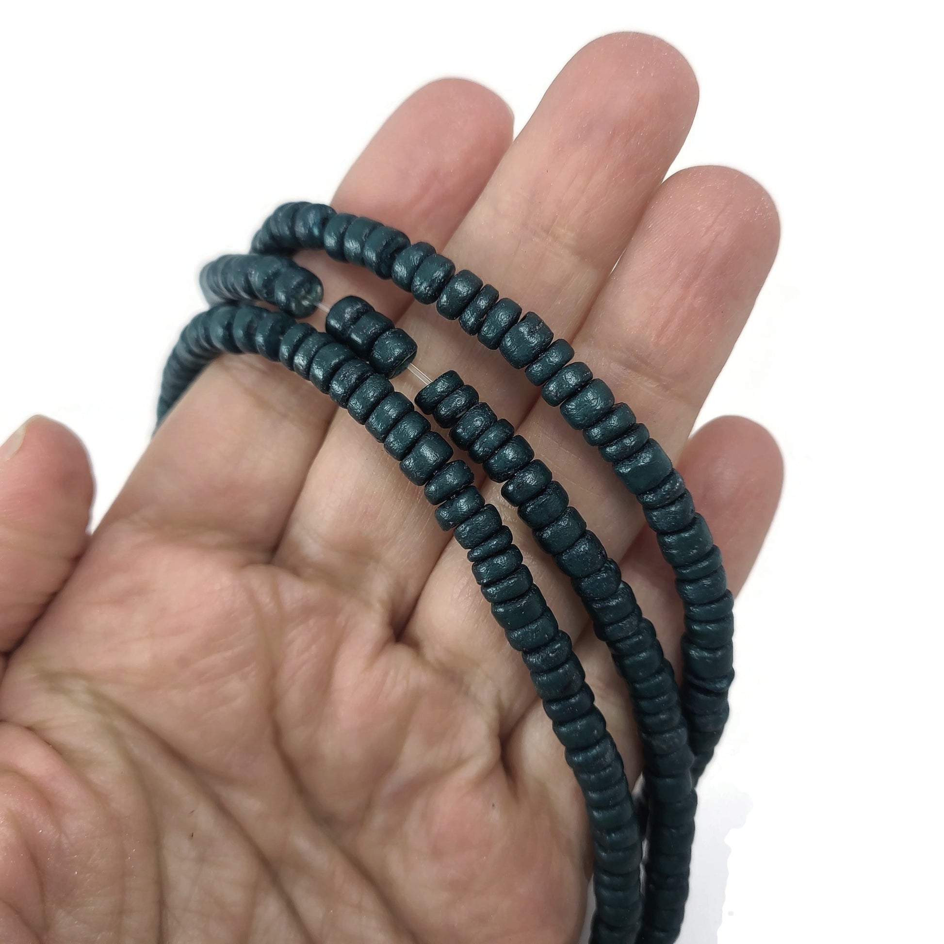 Teal green coconut rondelle beads 5mm