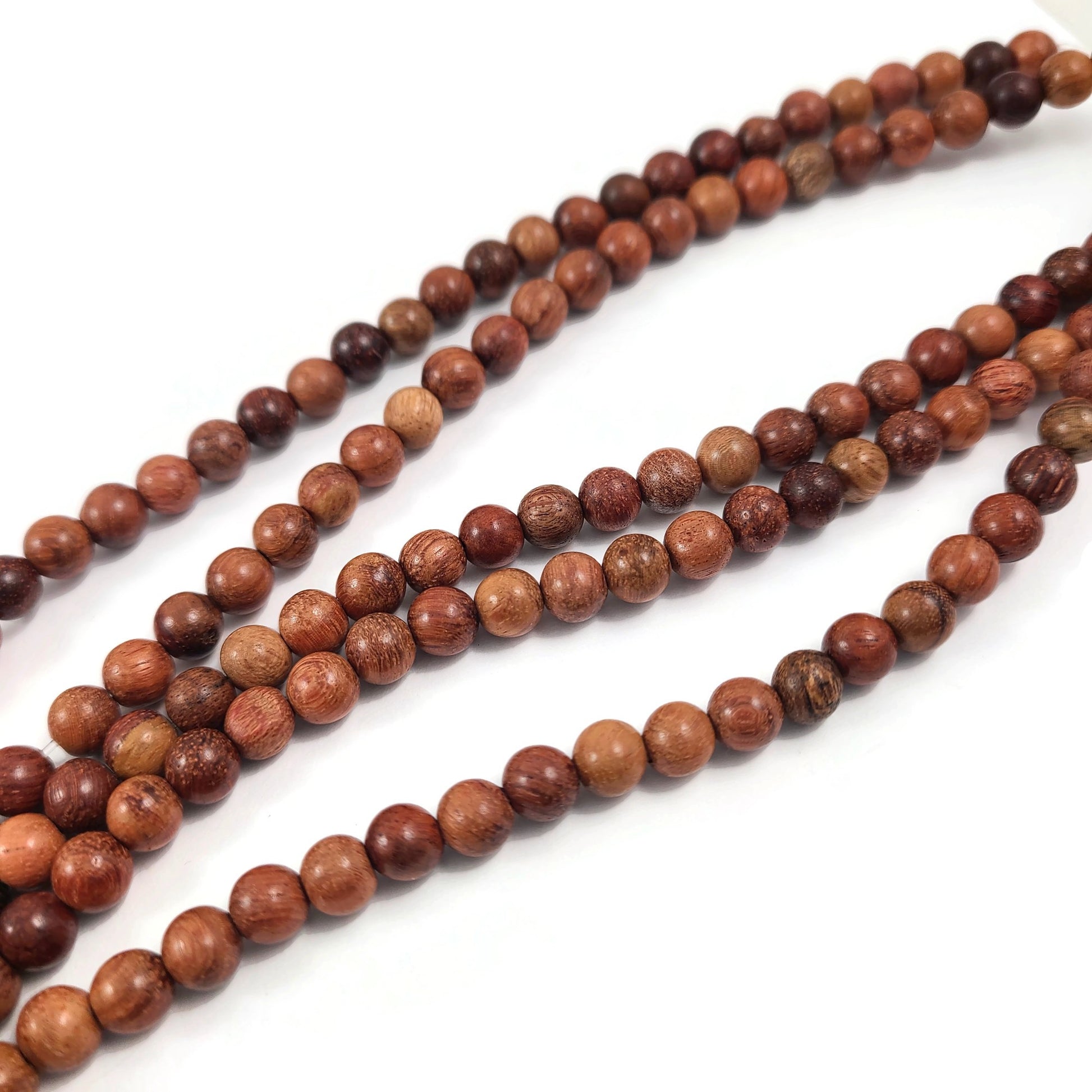Perles en bois de rose de Birmanie