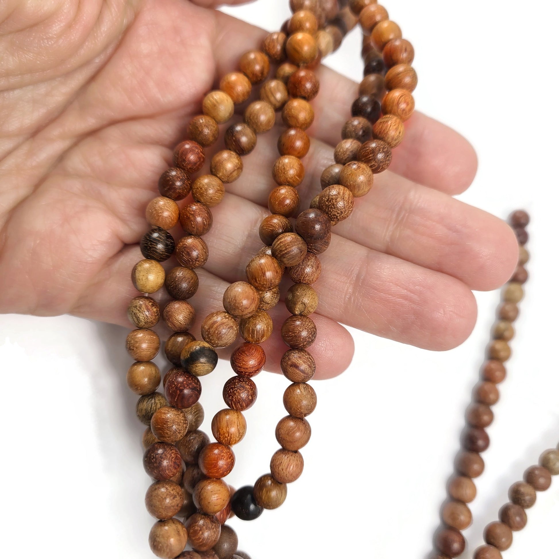 Perles en bois de rose de Birmanie