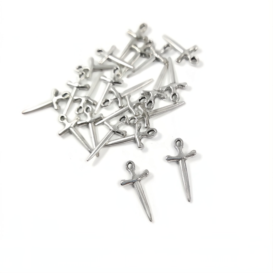 10 silver sword charms