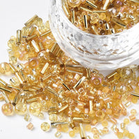 Golden glass seed bead grab bag, Mixed shapes