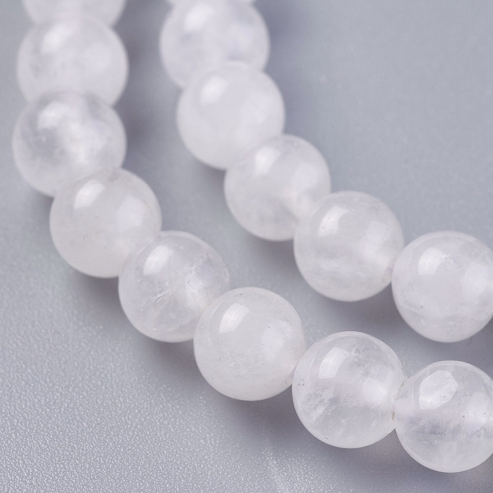 Perles de cristal de quartz naturel