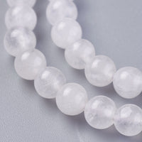 Perles de cristal de quartz naturel