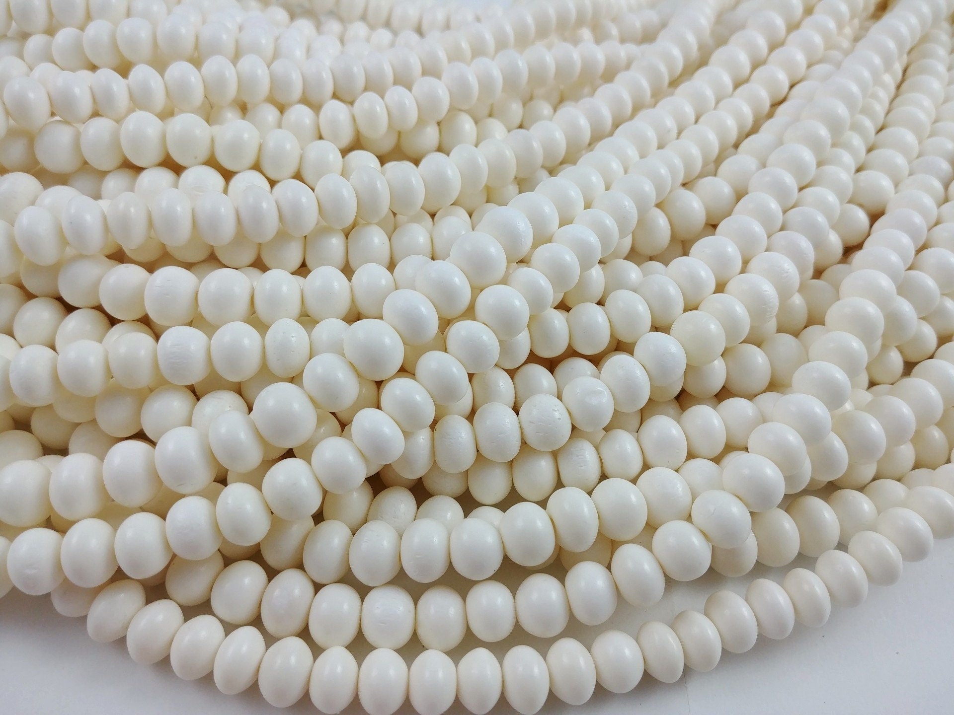 100 Perles rondes en os naturel blanc 3-4mm