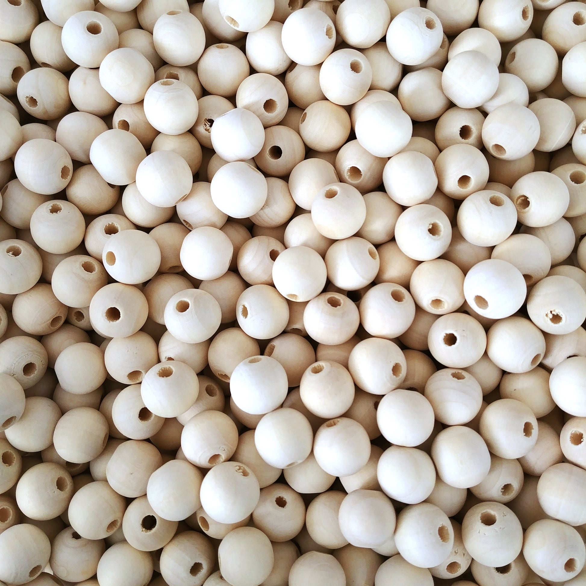 25 Perles en bois naturel 14mm