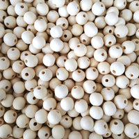 25 Perles en bois naturel 14mm