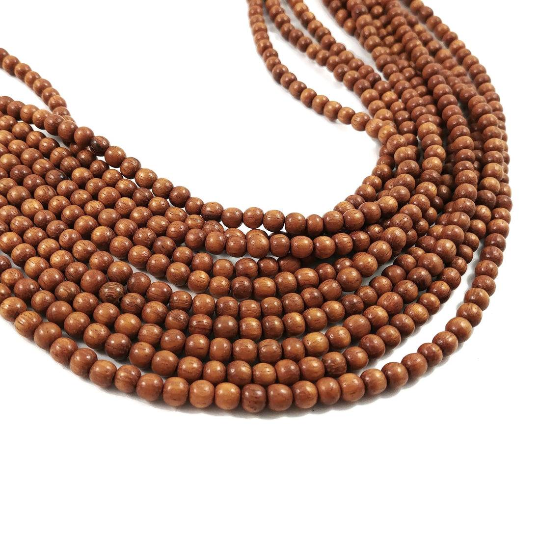 85 perles de bois exotique 4-5mm