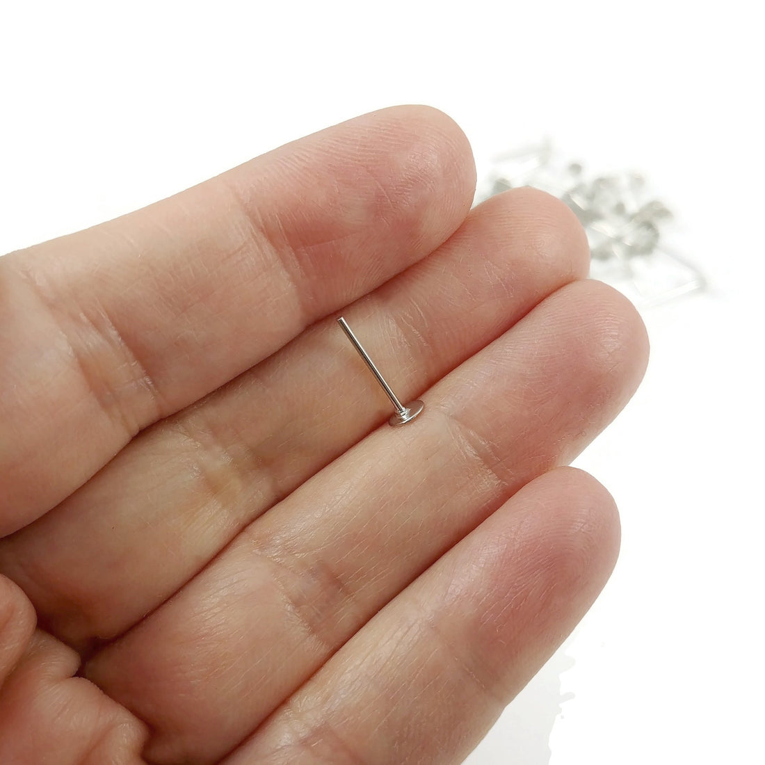 50 Earring stud posts, 4mm pad, silver. Nickel free, lead free and cadmium free