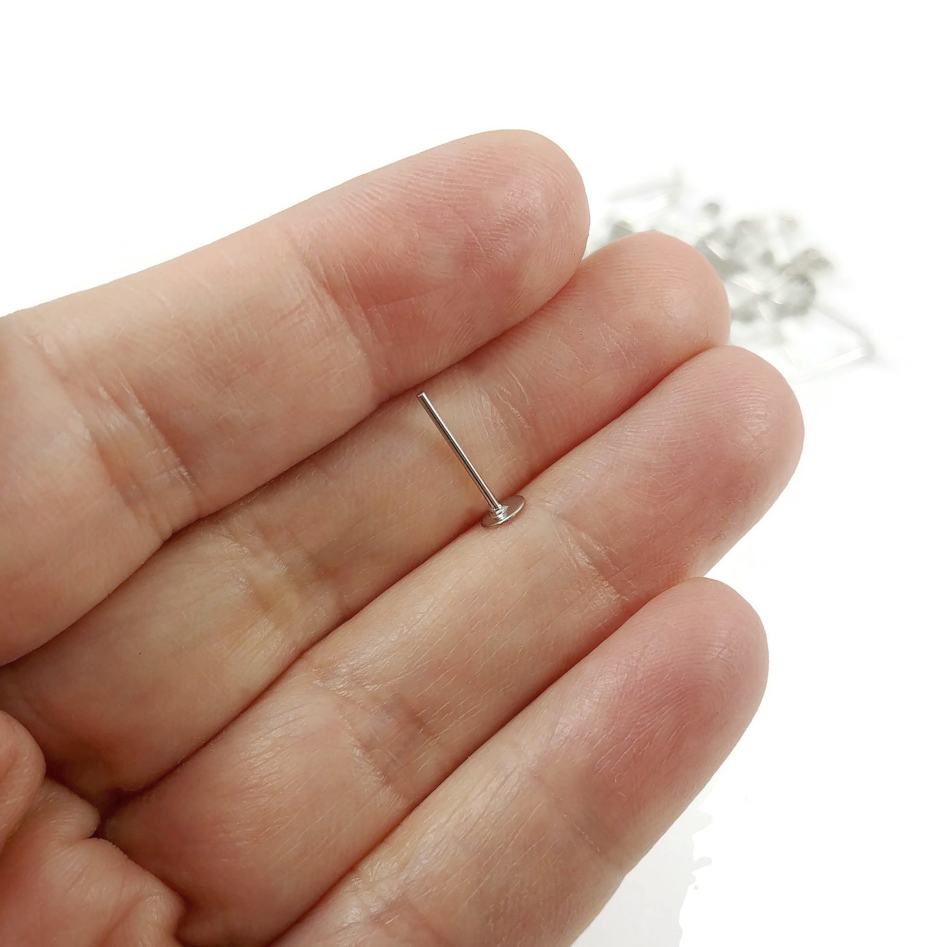 50 Earring stud posts, 4mm pad, silver. Nickel free, lead free and cadmium free