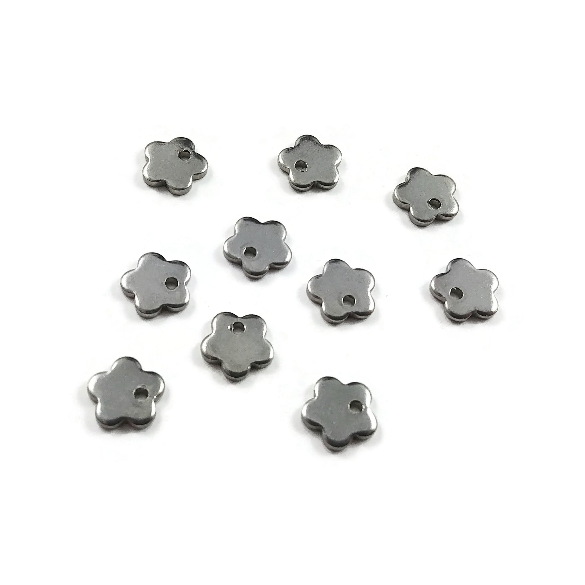10 Tiny flower charms stainless steel hypoallergenic charms