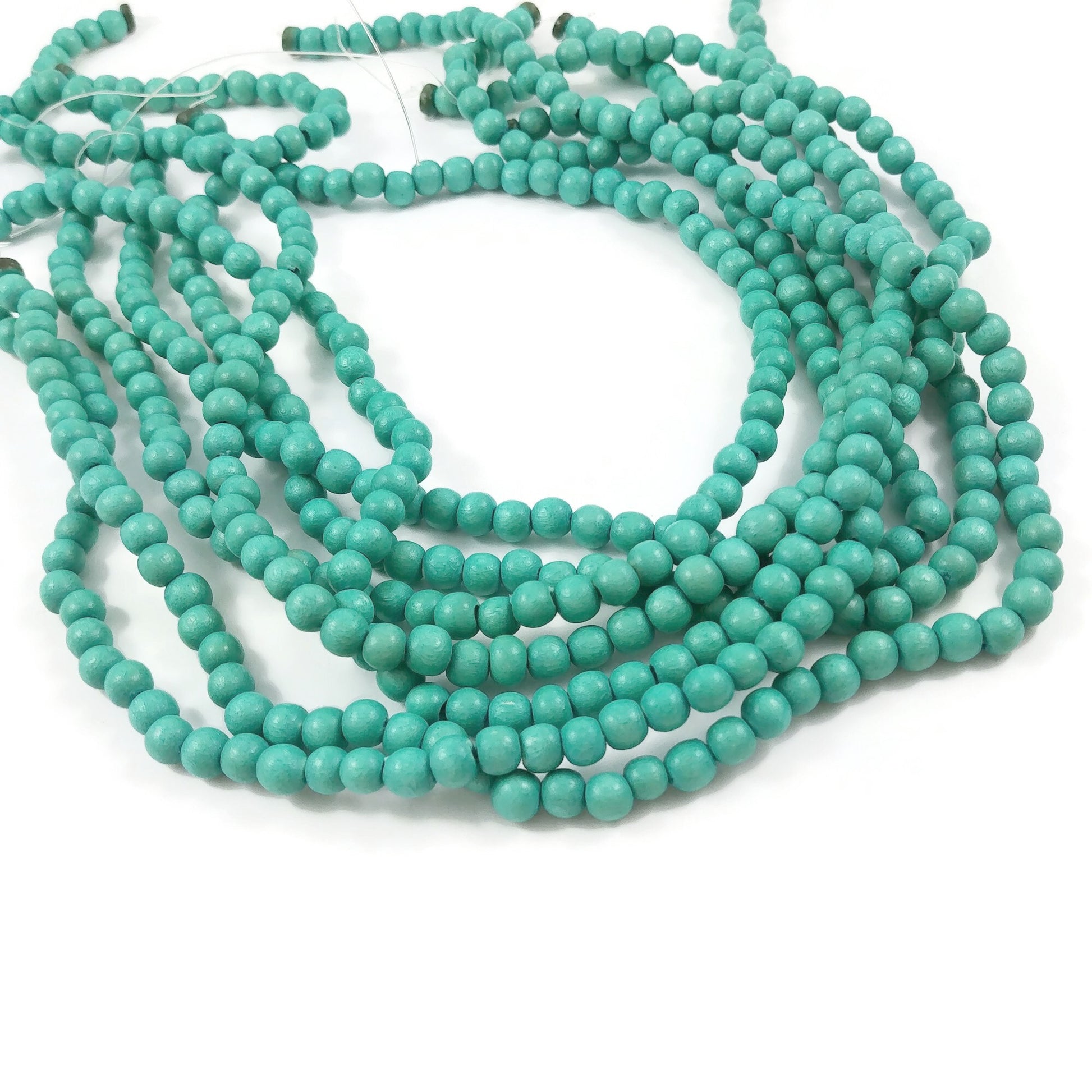 Turquoise 6mm, 8mm or 10mm wood round beads 16 inch strand