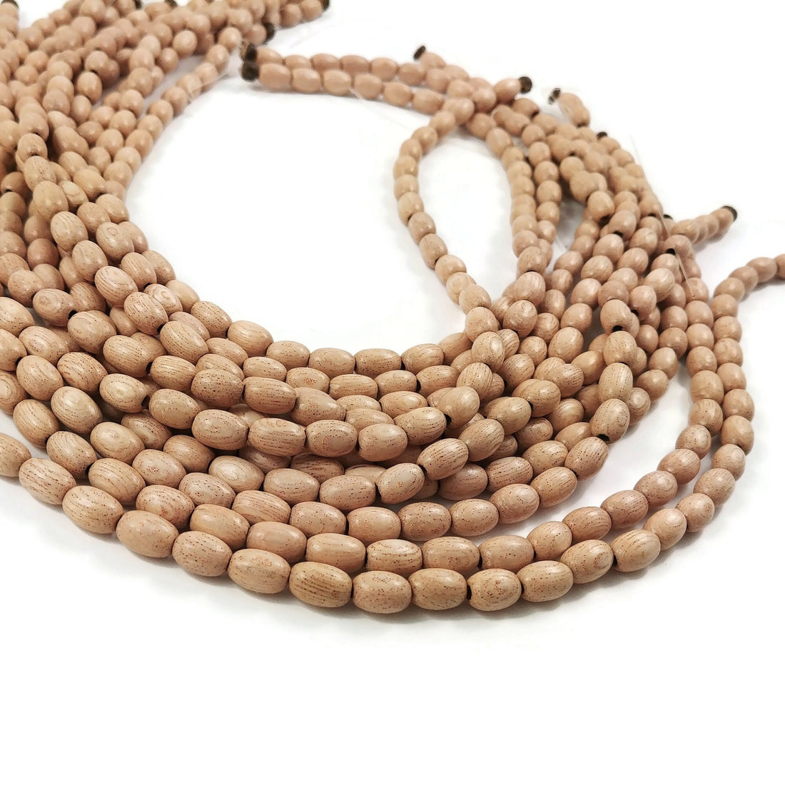 Perles ovales en bois de rose naturel 9x6mm