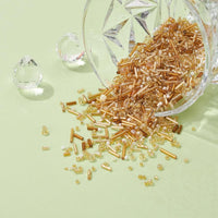Perles de rocaille en verre - DORÉ - Assortiment de formes et grandeurs
