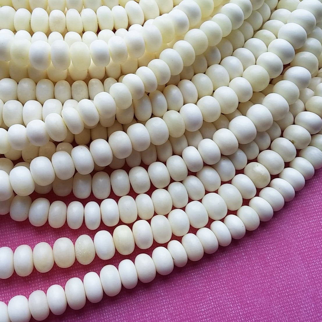 15 Perles rondelles en os naturel blanc 10mm