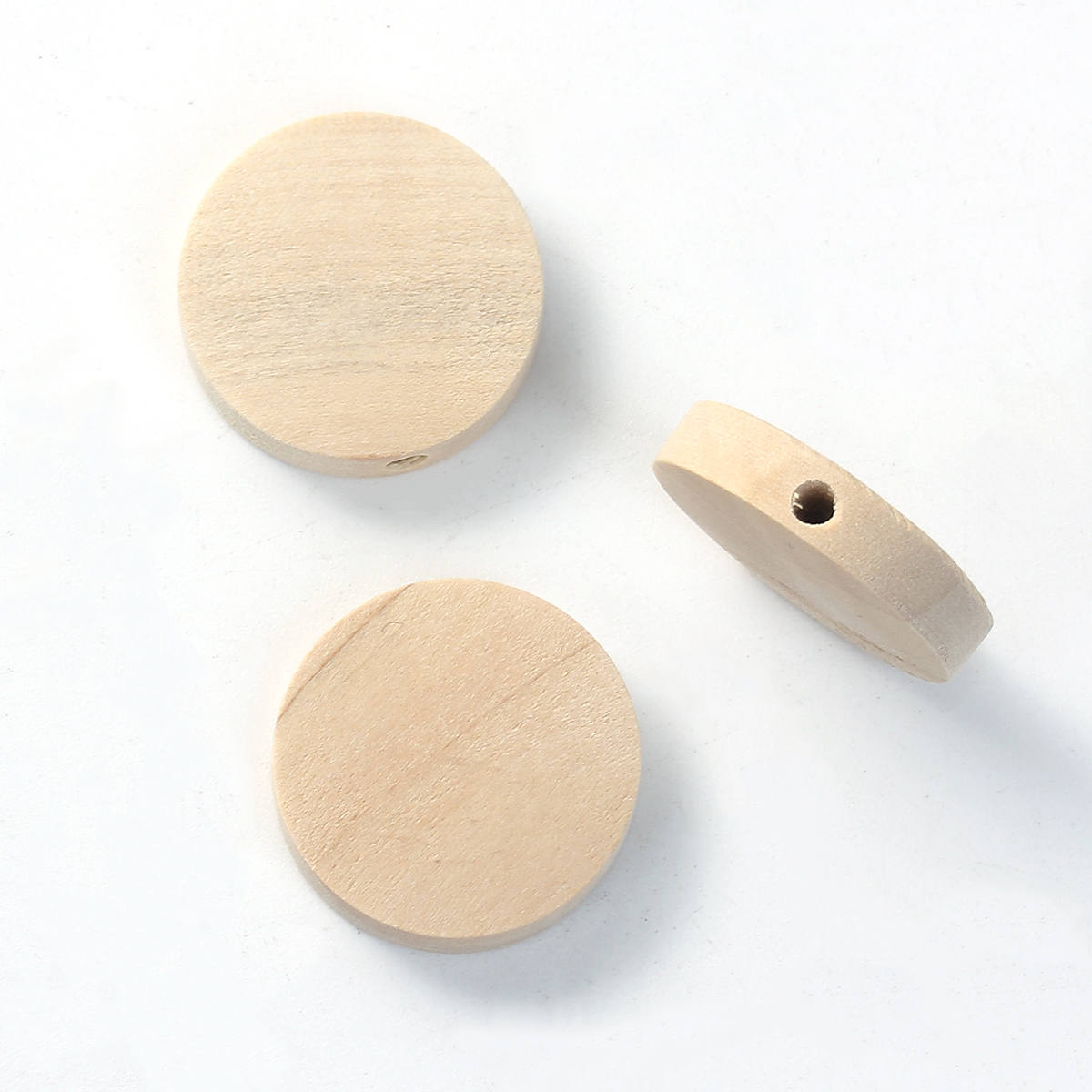 Perles de bois naturel en rondelle de 15mm, 20mm ou 25mm