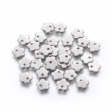 10 Tiny flower charms stainless steel hypoallergenic charms