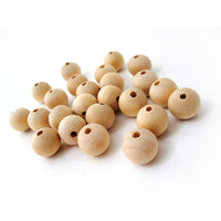 25 Perles en bois naturel 14mm