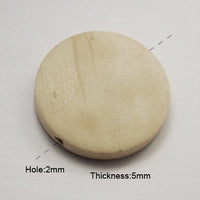 Perles de bois naturel en rondelle de 15mm, 20mm ou 25mm